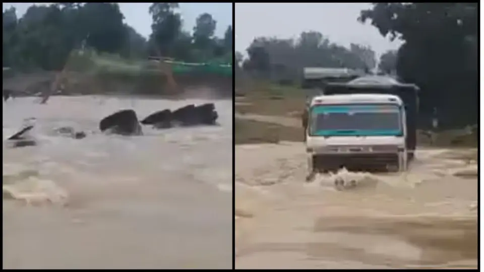 truck-swept-away-in-flood-2103535810