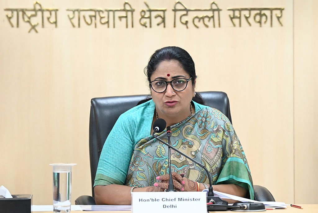Delhi CM Rekha Gupta Distributes Cheques To Families Of COVID-19 Victims