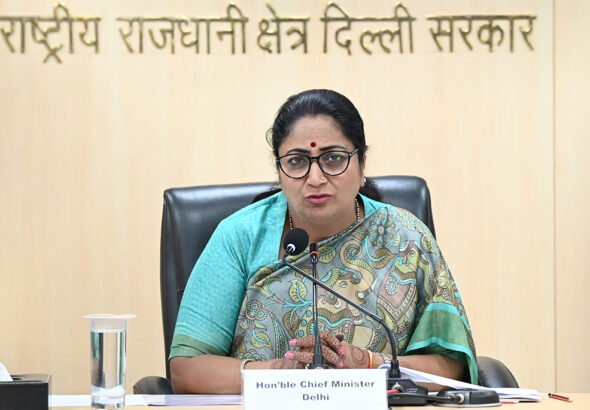 Delhi CM Rekha Gupta Distributes Cheques To Families Of COVID-19 Victims